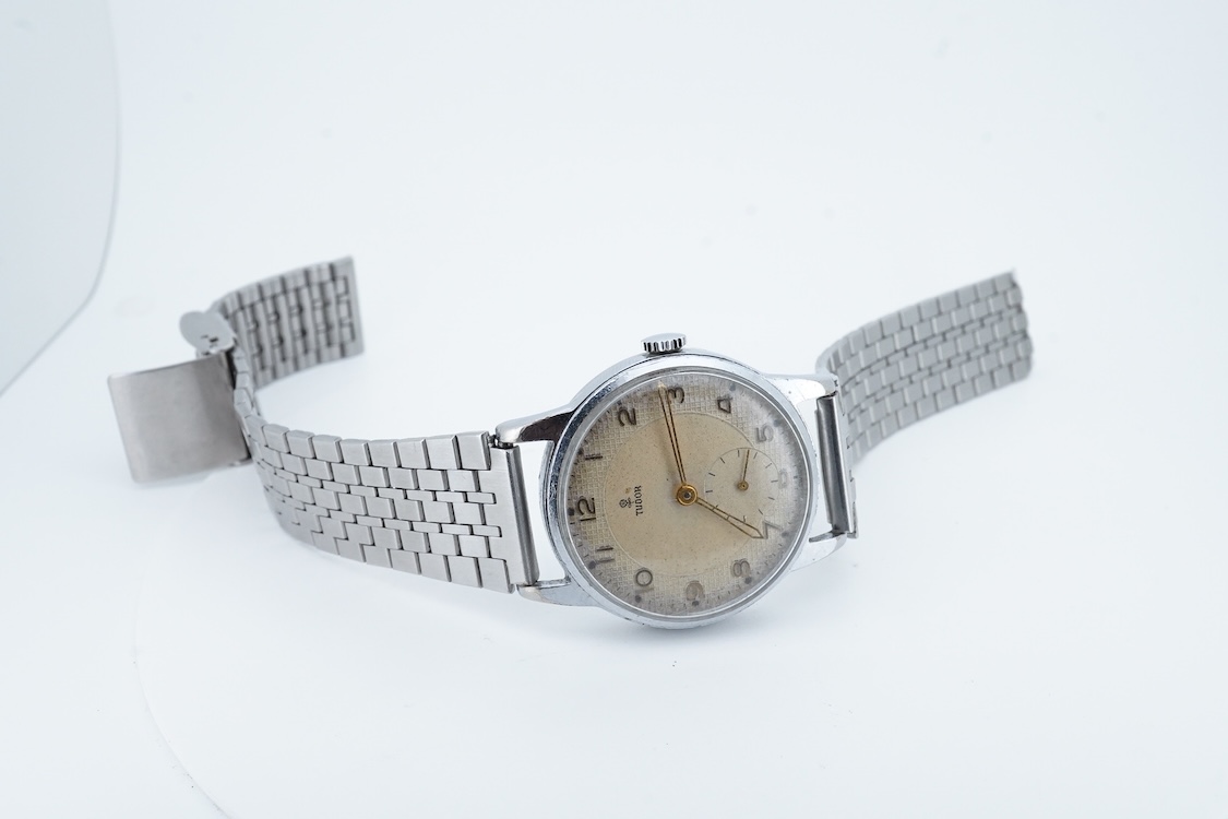 A gentleman's 1950's? steel Tudor manual wind wrist watch, with Arabic dial and subsidiary seconds, ETA movement 1260, case diameter 32mm, on an associated stainless steel strap, no box or papers.